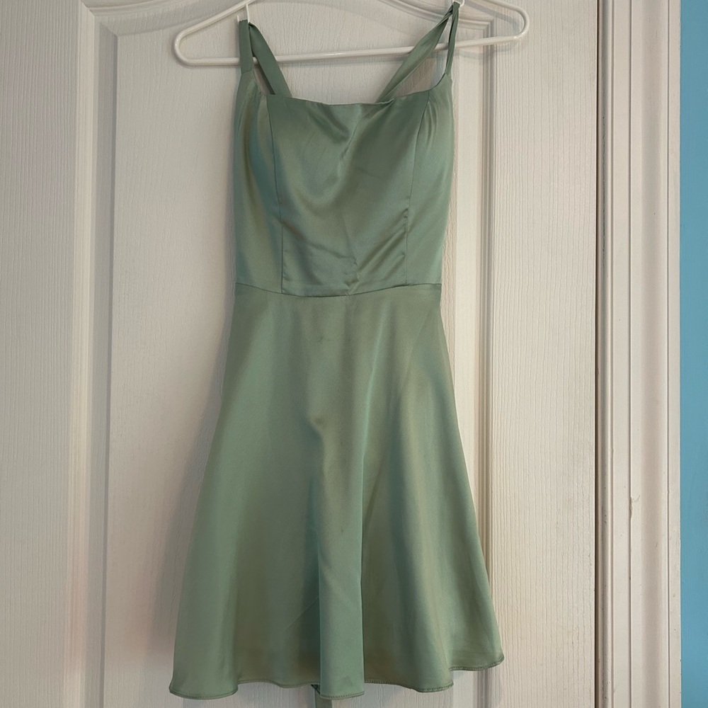 Fit and flare sage green mini dress cross tie back, padded